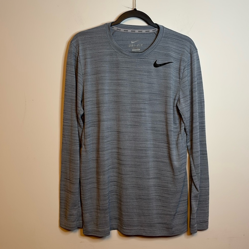 Nike dry fit, gray, athletic shirt, long sleeves with black swoosh size M